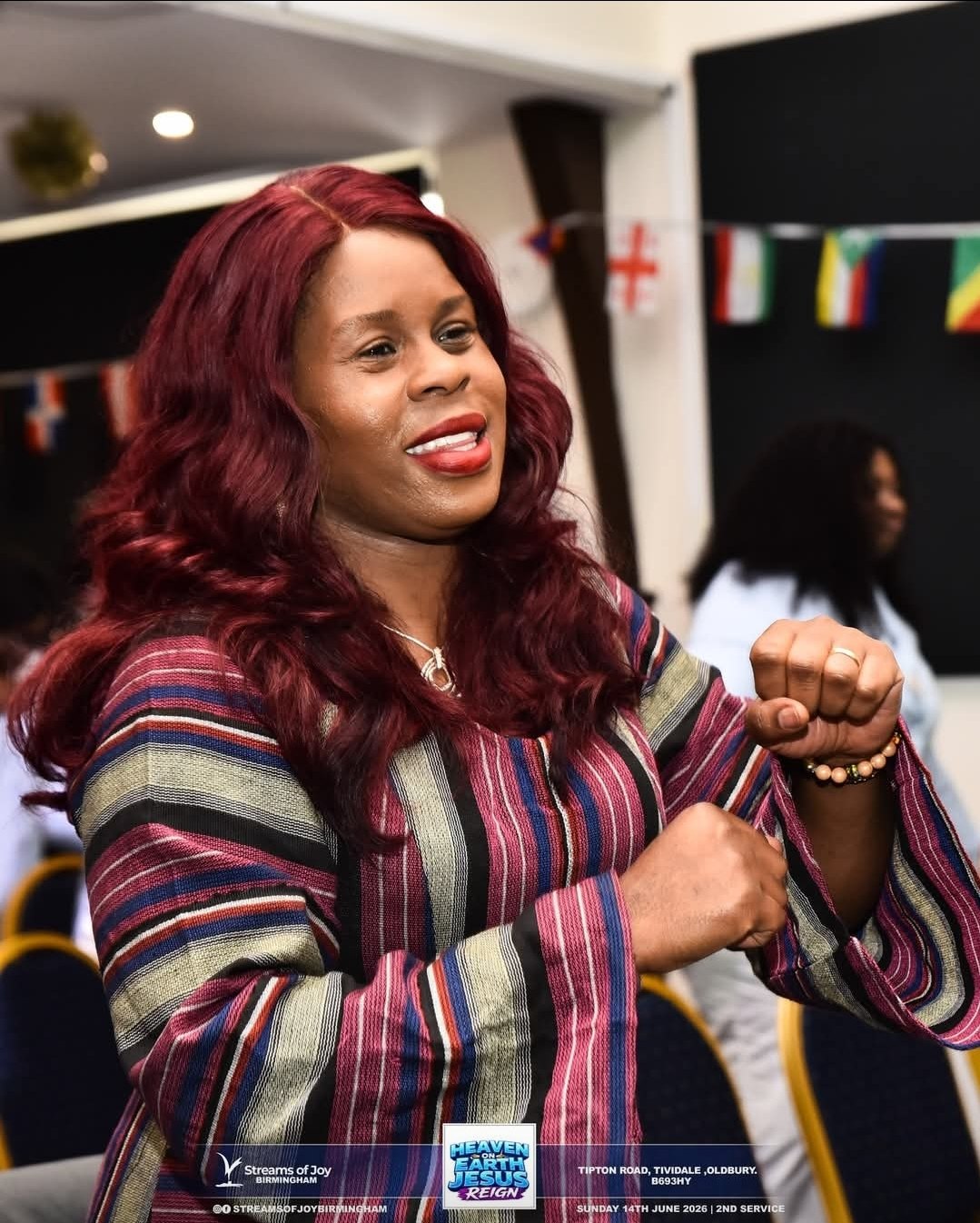 Streams of Joy Birmingham worshipper rejoicing during service